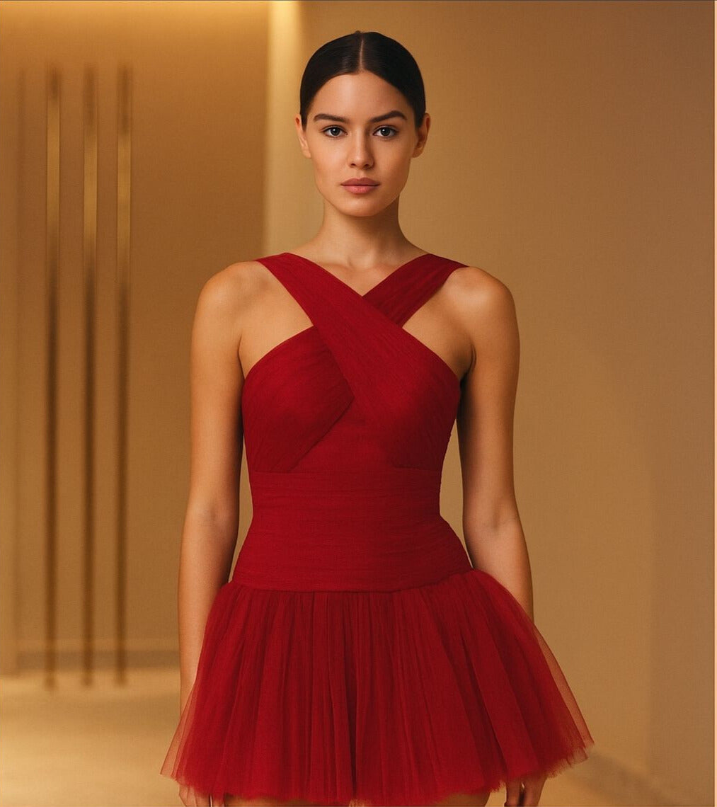 Woman in deep red criss-cross tulle mini dress from Prisella