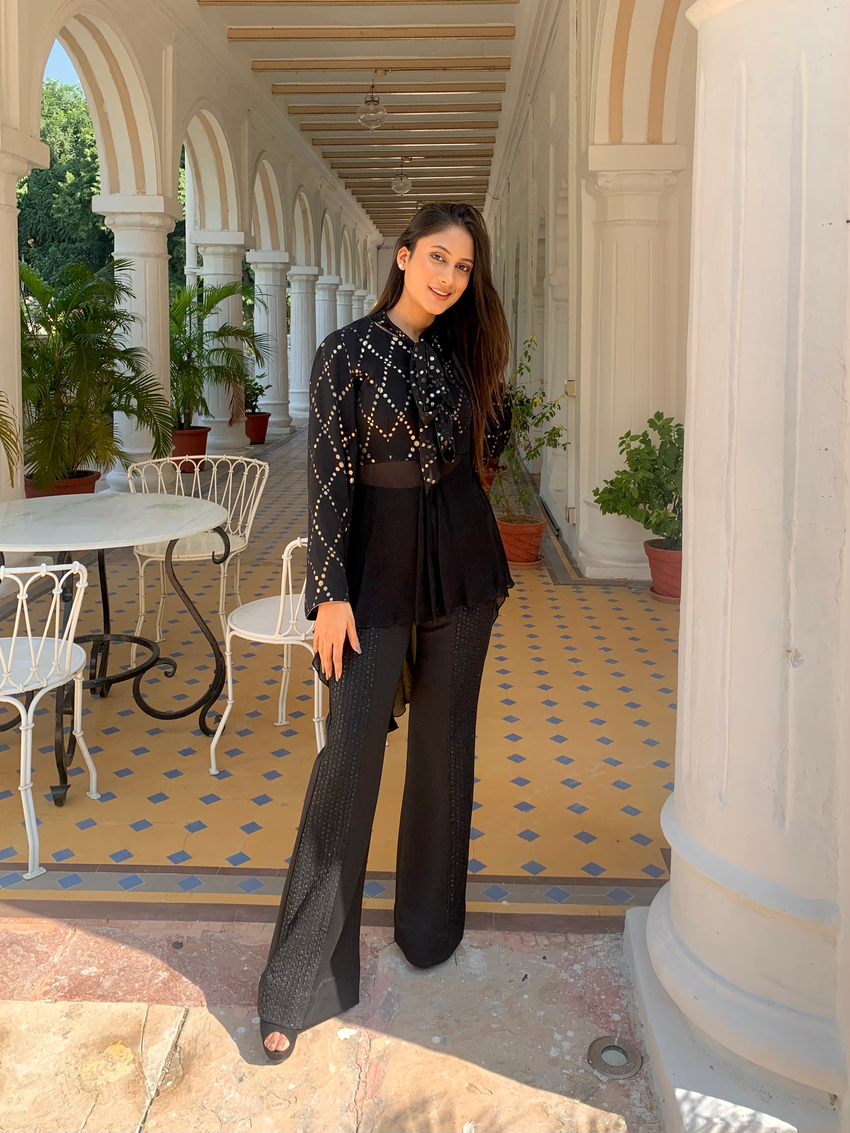 Prisella occasionwear in black with sheer and sparkle detailing