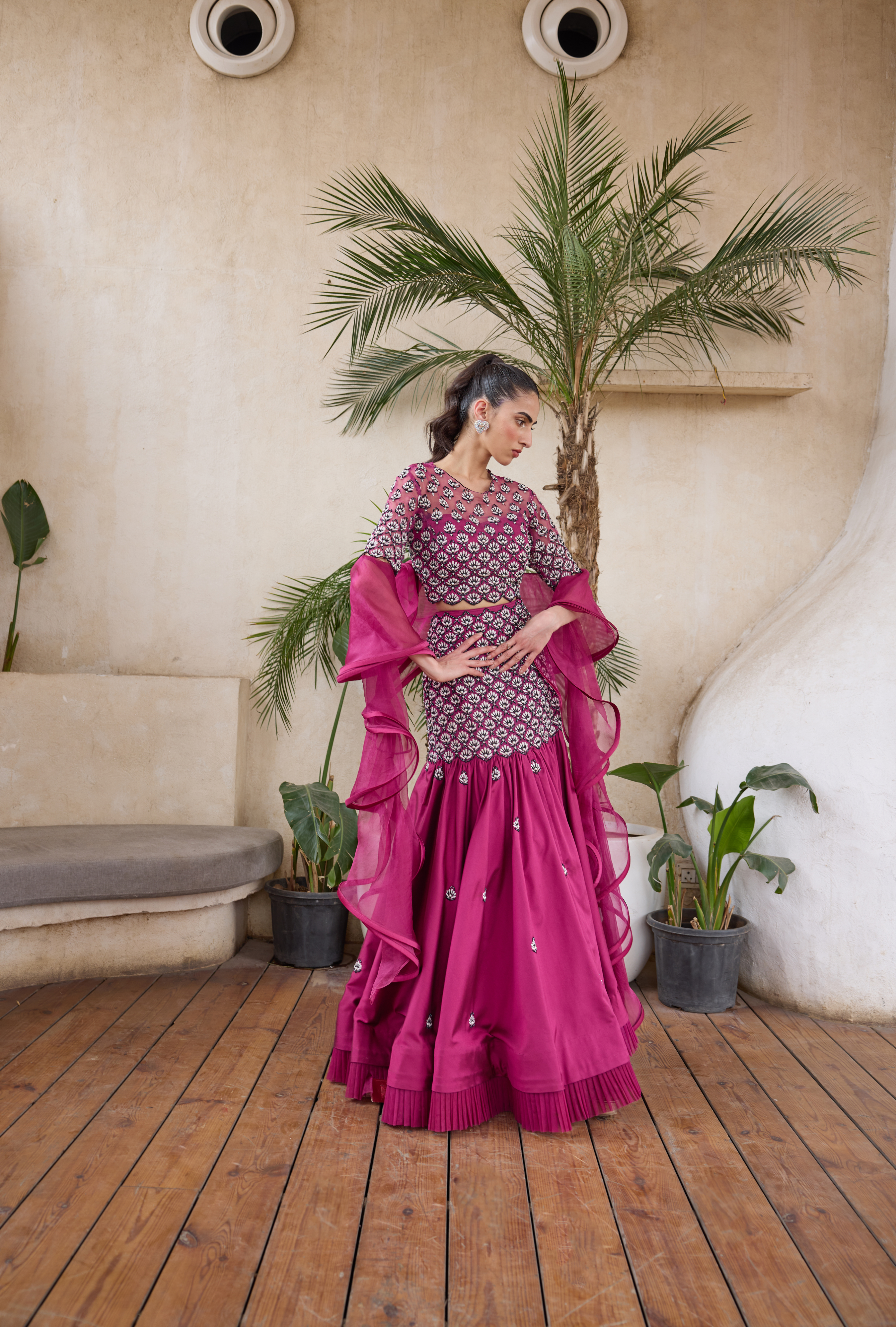 Elegant fuchsia lehenga with elbow-sleeve blouse and dupatta