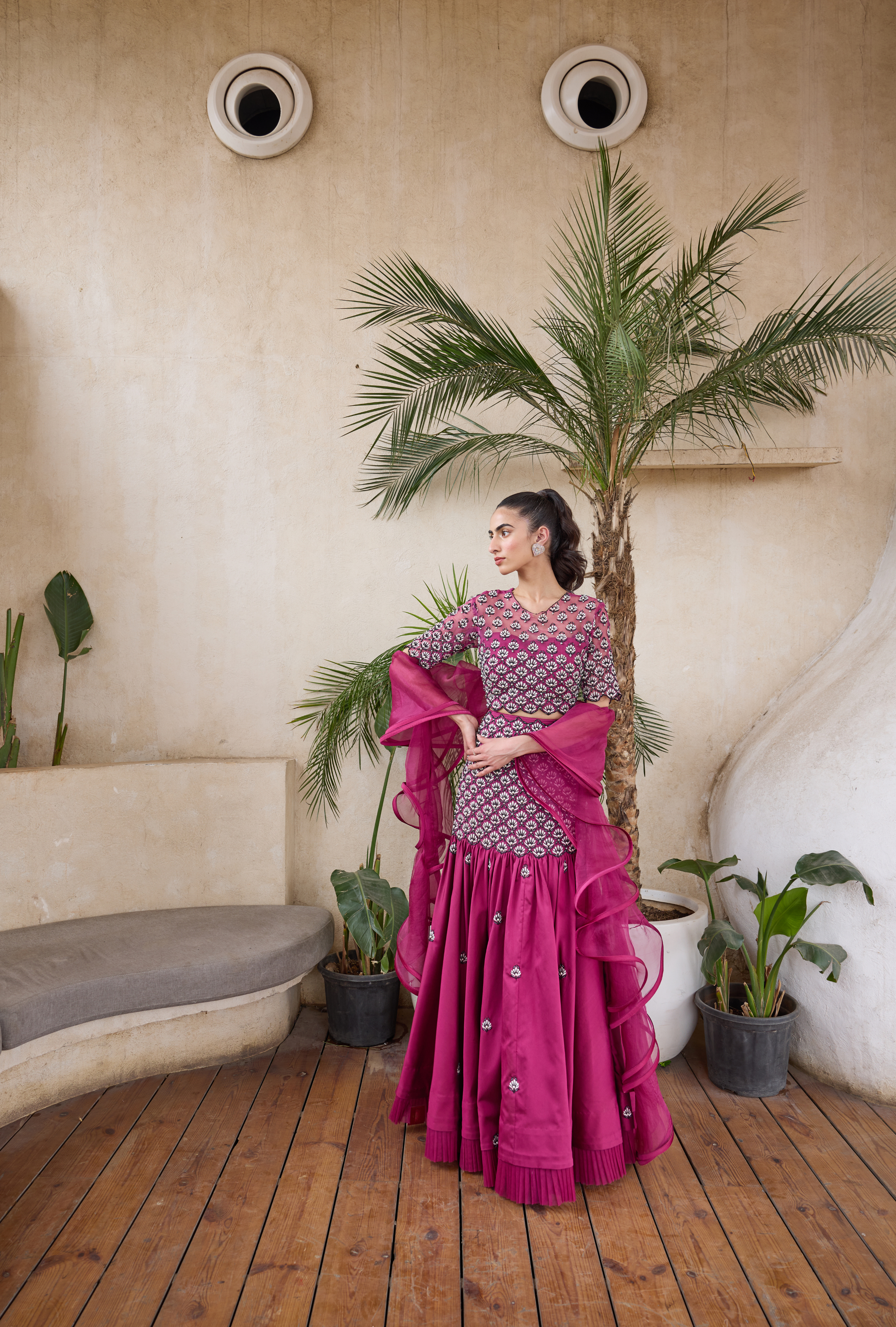 Elegant fuchsia lehenga with elbow-sleeve blouse and dupatta