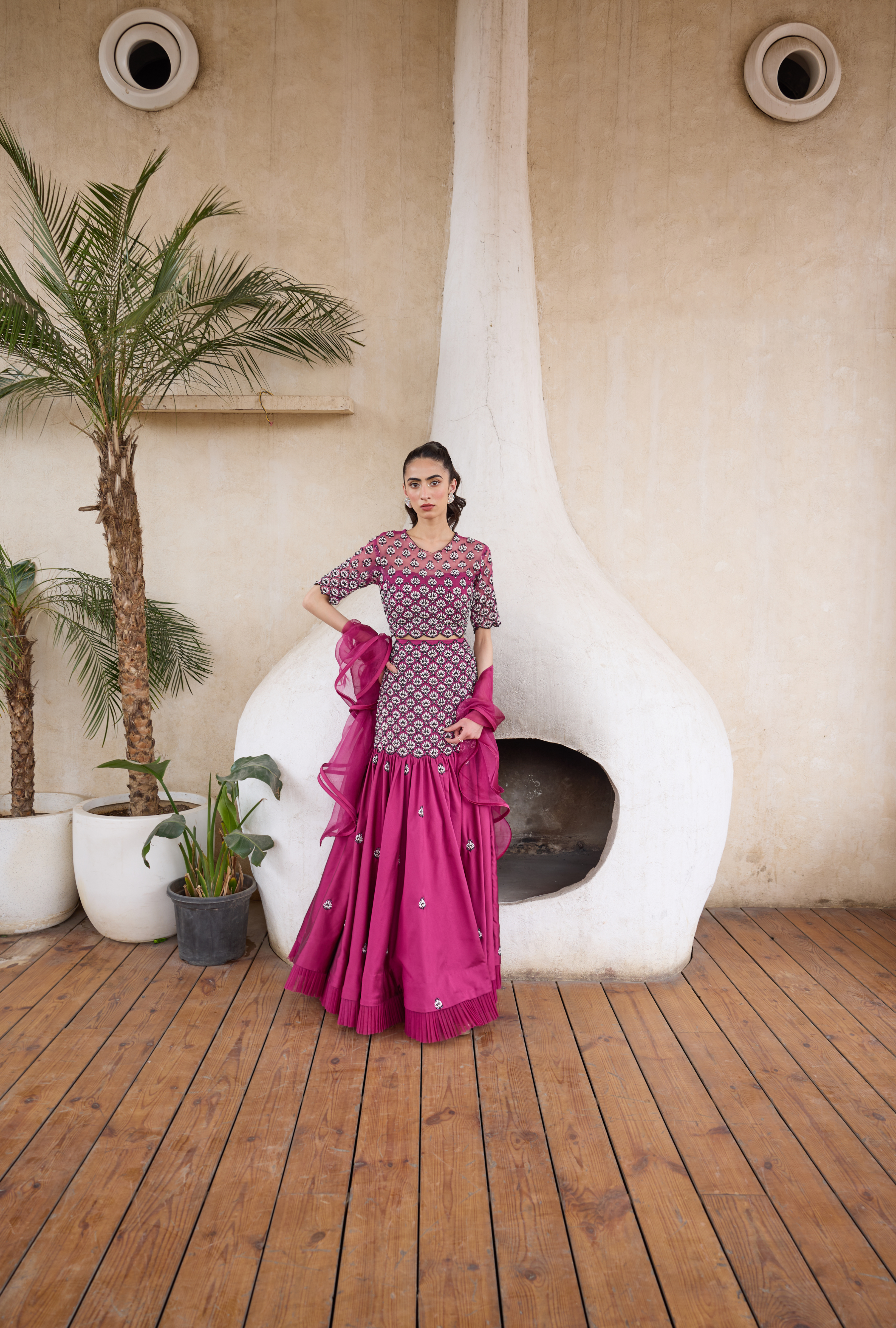 Fuchsia lehenga set with embroidered blouse and mirror work skirt