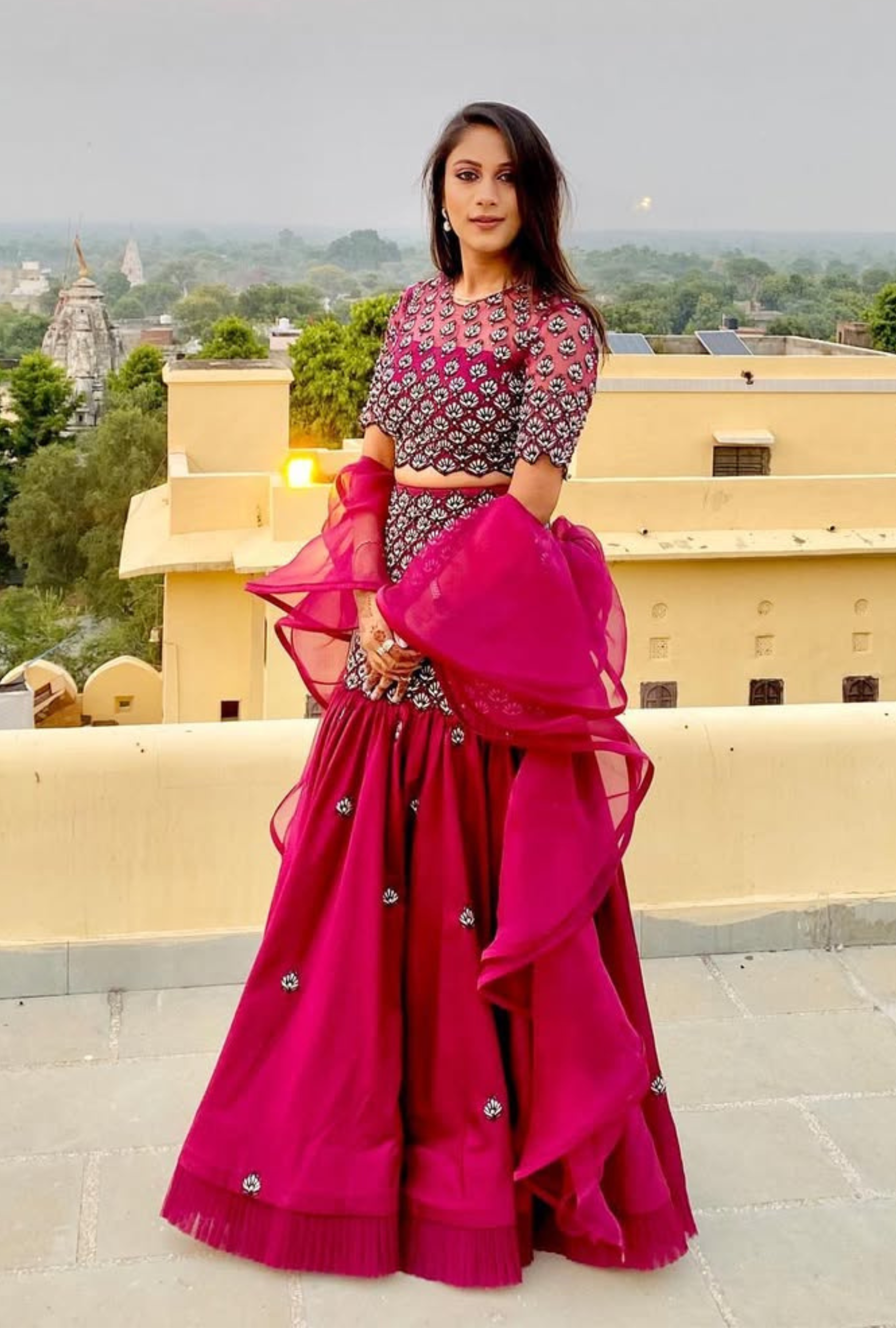 Designer festive lehenga set in fuchsia with tiered detailing