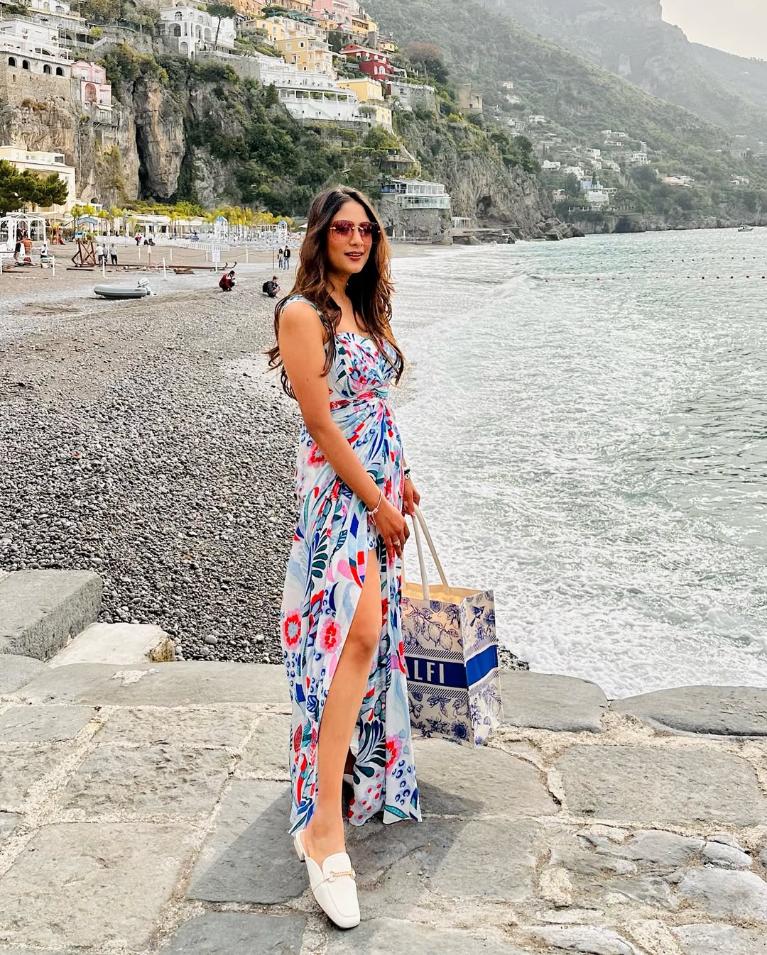 Elegant resort wear dress with vibrant print and breezy silhouette