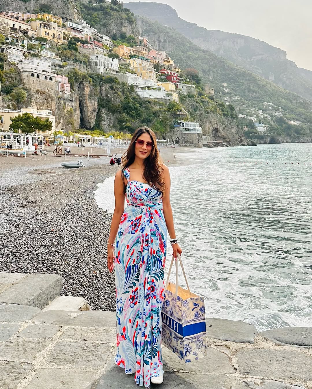 Vacation-ready printed maxi dress with side slit and shoulder straps