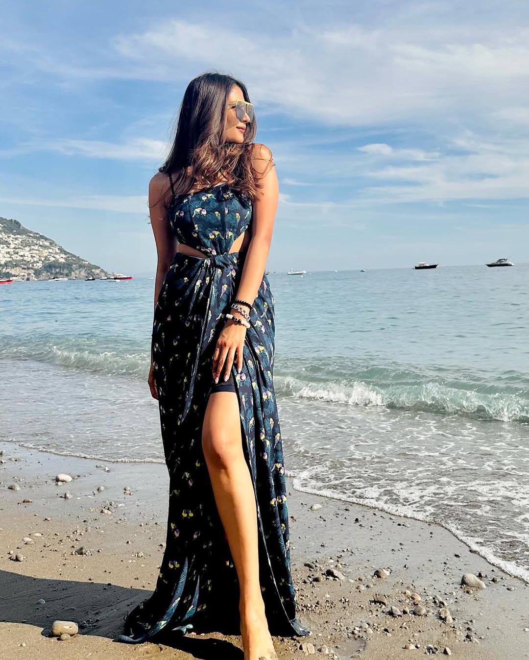 Beach vacation-ready drape dress in breathable floral print with twist waist