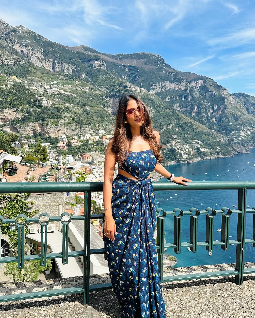 Elegant floral drape dress with sculpted waist and summer-ready silhouette